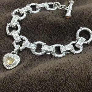 JUDITH RIPKA STERLING SILVER STAMPE HEAVY BRACELET